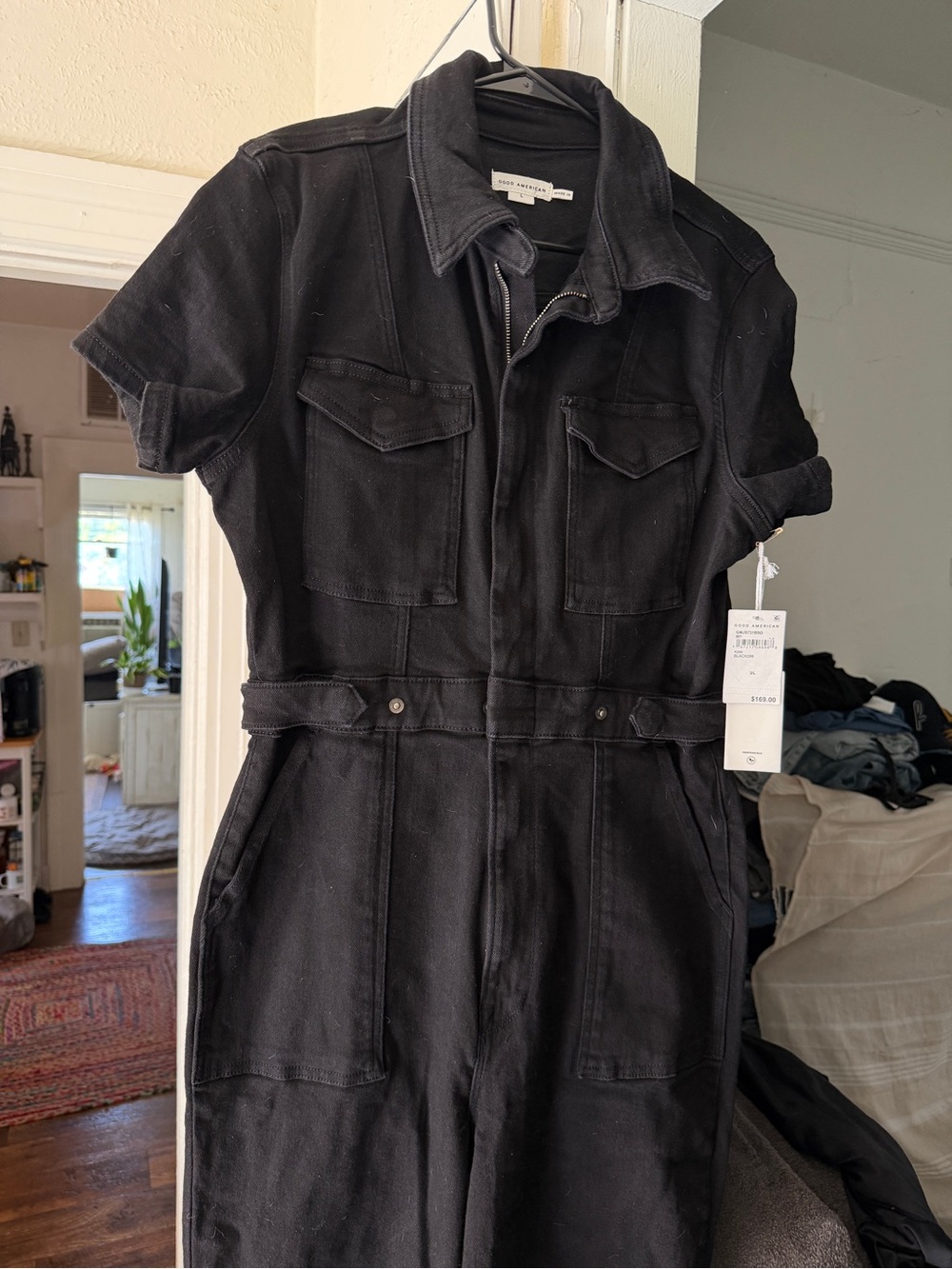 Good American Fit For Success Denim Jumpsuit in black.